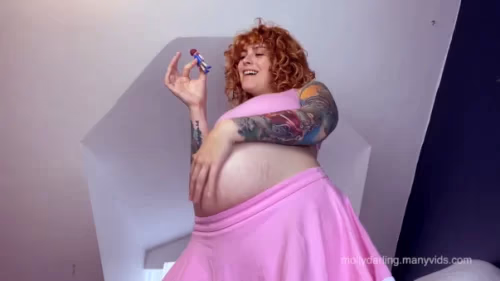 Molly Darling with a big bulging belly swallows you