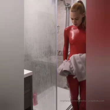VickyDeVika - Getting into red catsuit in shower | Fetish Video