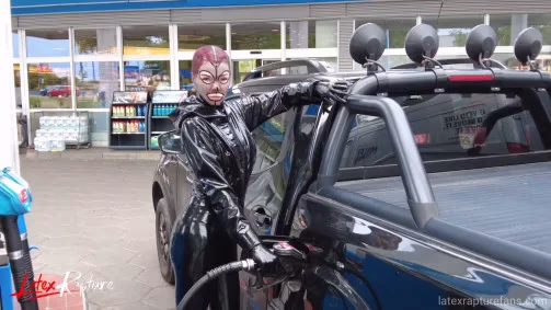 LatexRapture - The Silent Doll In Public | Shiny Clothes Video